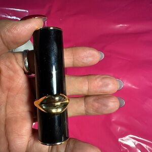Luxurious Black Lipstick by PatMcgrath with Gold Accent in shade 020 Femmebot.